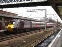 CrossCountry HST power car no 43366 on the rear of an early afternoon ECS working held at signals alongside platform 2 at Wakefield Westgate on 21 December while working towards Leeds.<br><br>[David Pesterfield 21/12/2011]