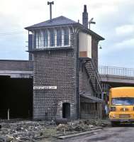 Located on the west side of the CR main line through Coatbridge, immediately to the north of the bridge carrying Whifflet Street, Whifflet North Junction was another casualty of Motherwell Power <br>
Box scheme in December 1973. The old box is seen here on 7th March 1971. [See image 10715]<br><br>[Bill Jamieson 07/03/1971]