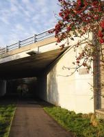 A bridge with a very short useful life! This sizeable structure was completed in 1961 to carry Auchinyell Rd over the Deeside line west of Ruthrieston station as the Aberdeen suburbs continued to spread. The line closed to passengers in 1965 with full closure in 1968.<br><br>[Brian Taylor 27/12/2011]