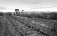 The disused line to the British Aluminium Company, Falkirk, with the works dominating the view on 20 March 1992. The last of the buildings alongside David's Loan was demolished in autumn 2006. An ASDA distribution depot now occupies much of the site.<br><br>[Bill Roberton 20/03/1992]