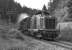 The 07.03 Rottweil - Villingen and 08.40 return was still a regular steam duty in the summer of 1974. In earlier years a class 078 4-6-4T would probably have been the regular power but, with steam at its last gasp in the Black Forest, a class 50 2-10-0 was by then the best that could be expected. On 4 September 1974 the return train from Villingen was provided with such a locomotive operating tender first with B-B diesel No. 211 215 as pilot. The train was photographed between Deisslingen and Rottweil.<br><br>[Bill Jamieson //1974]