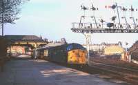 A Class 40 at the head of a 'Mystery Excursion' is illuminated by a low afternoon sun as it prepares to return from Scarborough to Edinburgh in 1971.<br><br>[David Spaven //1971]