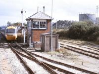 An HST bound for Newquay photographed at Goonbarrow Junction signal box in October 1992. In the background are the works and exchange sidings of the Rocks china clay complex.<br><br>[Ian Dinmore /10/1992]