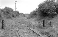 End of the line at Bowhill in May 1991, with track lifted beyond the NCB gate. (The pit closed in 1968 but the preparation plant survived into the 1980s).<br><br>[Bill Roberton 17/05/1991]