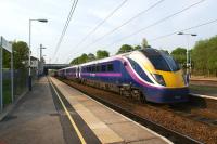 180108 arrives at Leyland with a service to Manchester from Blackpool on 29 April 2011.<br><br>[John McIntyre 29/04/2011]