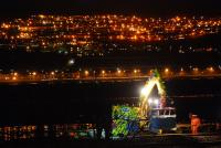 Embankment repairs continue into the night east of Cardross. A road-rail crane lifts materials.<br><br>[Ewan Crawford 05/01/2012]