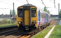 156487 arrives at Leyland platform 1 on 29 April 2011 with a Liverpool Lime Street - Blackpool North service.<br><br>[John McIntyre 29/04/2011]