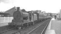 No 48 stands at Lurgan in August 1965 with a train to Belfast Great Victoria Street.<br><br>[K A Gray 28/08/1965]