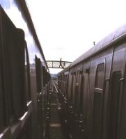 View south from an up train standing at Dingwall in the summer of 1974. The appearance of 3 trains is thought to have been caused by the late running southbound service. [With thanks to all who responded to this query].  <br><br>[David Spaven //1974]