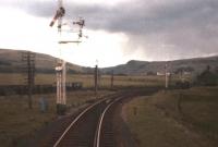 The approach to Gleneagles, seen from the Crieff branch in the summer of 1961. The wagons are on the siding alongside the down main line in the V of the junction. [With thanks to all who responded to this query.]<br><br>[Frank Spaven Collection (Courtesy David Spaven) //1961]