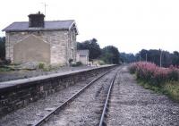 View east at Redmire in July 1989. The station is currently the western terminus of the Wensleydale Railway, although an  arrangement between the MoD and WRA still sees occasional trainloads of military vehicles using the line from time to time [see image 6503].<br><br>[Ian Dinmore /07/1989]
