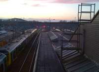 Milton Keynes can look surprisingly old-fashioned early in the morning, with more than a hint of <I>'The Ladykillers'</I> in the staircase on the right. View south from the station footbridge on 18th November 2011.<br><br>[Ken Strachan 18/11/2011]