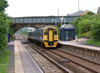 158754 heads west through Hapton station in east Lancashire on 15 June 2010 with a York - Blackpool North service.<br><br>[John McIntyre 15/06/2010]