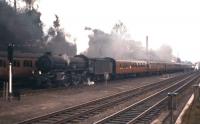 The empty coaching stock for the <I>'Heart of Midlothian'</I>, hauled by a B1 and banked by a V3, restarts following a signal check at Calton Tunnel on Saturday 26th May 1962. <br><br>[Frank Spaven Collection (Courtesy David Spaven) 26/05/1962]