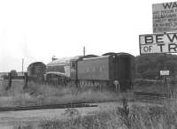 LNER 4498 <I>Sir Nigel Gresley</I>, receiving assistance from an NCB diesel locomotive on the Lambton system at Philadelphia in April 1972. Note the level (?!?) crossing - protected by multiple warning signs of varying vintage.<br><br>[Brian Taylor 16/04/1972]