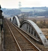 With the rear of the afternoon Milerhill to Inverness class 8 freight on the River Earn bridge, EE Type 4 No. 367 is invisible as it crawls towards Hilton Junction on 3 March 1971, having received a cautionary aspect at the down distant signal [see image 36298].<br><br>[Bill Jamieson 03/03/1971]