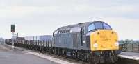 The last of the green class 40s, no 40106, runs south through Church Fenton with a freight on 17 April 1980.<br><br>[Peter Todd 17/04/1980]