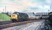 Freight traffic through Carstairs on the morning of Saturday 23rd May 1970 had been much thinner than might have been expected from what was shown in the previous winter's WTT but this was compensated by a flurry of unexpected workings in the late afternoon. Here EE Type 3 no 6842 heads north at 16.13 on a special mixed freight, probably plying between Carlisle and Mossend Yards.<br><br>[Bill Jamieson 23/05/1970]