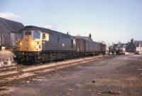 D5308 shunts seed potato wagons at Maud Junction en route to Fraserburgh on 27th March 1973.<br><br>[David Spaven 27/03/1973]