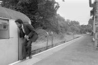 <I>'Oooohhh... these Central Line driving cabs do nothing for your back...' </I> Changing ends at Ongar for the return trip to Epping on 23 July 1993 [see image 37369]. <br><br>[Bill Roberton 23/07/1993]