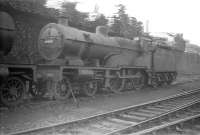 Undated photograph of compound 40936 in a siding alongside Birmingham's Monument Lane shed. Officially withdrawn from here in January 1961 the locomotive was cut up at Cashmore's, Great Bridge, 8 months later. [See image 40961]<br><br>[Robin Barbour Collection (Courtesy Bruce McCartney) //]