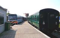 The preserved and rebuilt station at Downpatrick on what is now the heritage <I>'Downpatrick and County Down Railway'</I>, looking from the buffer stops on 24 May 2008. To the left is former NIR railbus RB 003, ex-LEV3, ex-DB977020, the third of BR's prototypes which, regauged to 5'3' worked the Coleraine / Portrush line for about 10 years from 1982. The signals were relocated from Bangor [see image 24989].<br><br>[Colin Miller 24/05/2008]