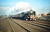 Gleaming A1 Pacific no 60162 <i>'Saint Johnstoun'</i> has just cleared the bridge carrying the Caledonian Leith lines over the E&G and is about to run past its home shed at Haymarket on 28 March 1959 with a train for Aberdeen.<br><br>[A Snapper (Courtesy Bruce McCartney) 28/03/1959]