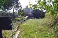 The view from the buffer stops at Downpatrick station on 24 May 2008 through the tangled security fencing. [See image 37451]<br><br>[Colin Miller 24/05/2008]