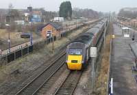 HST power car 43301 leads a southbound Cross County service on the Up Fast line passing through the middle of Thirsk's platforms on 4 February 2012. Stopping services can now only use the outer (slow line) faces of the island platforms. View north towards Northallerton. <br><br>[Mark Bartlett 04/02/2012]