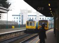 121032 and 142074 departing from Cardiff Queen Street on 31 January 2012 with services to Cardiff Bay and Radyr respectively.<br><br>[David Pesterfield 31/01/2012]