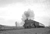 A train on the Ayrshire coast line heading north away from Ardrossan in 1962.<br><br>[R Sillitto/A Renfrew Collection (Courtesy Bruce McCartney) //1962]