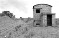 Remains of the Cronberry No 4 signalbox at Cronberry, looking west on the Muirkirk branch in July 1998. [Railscot note: the signalbox is named for Pit No 4, not because there are another 3 Cronberry signalboxes. The branch ran east to  Cronberry Colliery and finally on to Cronberry Moor Colliery. The junction here was re-aligned on at least one occasion, on the doubling of the line and on the opening of Cronberry Moor Colliery.]<br><br>[Bill Roberton 16/07/1998]