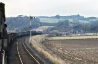 The driver of EE Type 4 No. 367 has judged things nicely and has managed to avoid coming to a complete stop at Hilton Junction on 3 March 1971 with the 13.02 Millerhill to Inverness class 8 freight. The freight was conveying extra brake vans for the use of members of the EURS [see image 37208].<br><br>[Bill Jamieson 03/03/1971]