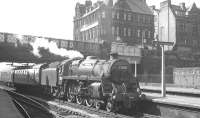 The 12.40pm Gourock - Leicester Midland arrives at Carlisle on 17 July 1965 behind Polmadie Class 5 4-6-0 no 73059.<br><br>[K A Gray 17/07/1965]