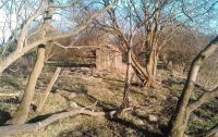 Looking east at the site of Gask Junction in February 2012 with the line to Steelend behind the camera. The Gask branch ran to the left of the hut with the route back towards Dunfermline on the right. <br><br>[Grant Robertson 12/02/2012]