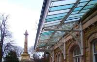 The forecourt of the former Alnwick terminus looking north east on 16 February 2012. In the background, beyond the station canopy, is the town's <I>'Tenantry Column'</I> topped by the 'Percy' lion.<br><br>[Colin Alexander 16/02/2012]