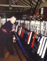 Signalman at work - Crewe Junction box, Shrewsbury, October 1989.<br><br>[Ian Dinmore 26/10/1989]