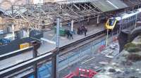 Over the wall from Market Street a CossCountry Plymouth service awaits departure from Waverley platform 8 on 15 February amid the ongoing reconstruction works.<br><br>[Andrew Wilson 15/02/2012]