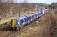 380 101 passes Blindwells with the 11.27 from North Berwick to Edinburgh on 21 February.<br><br>[Bill Roberton 21/02/2012]