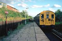 Prior to the opening of Watford football stadium halt in 1982, the only intermediate station on the Watford High Street to Croxley Green branch was Watford West. This photo, taken at Watford West on the afternoon of 20th September 1979, shows a Class 501 EMU departing for Watford Junction.<br><br>[Mark Dufton 20/09/1979]