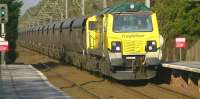 Freightliner class 70 Heavy Haul locomotives have reappeared on 'blending coal' runs from Hunterston to Killoch. 70013 handled the morning run on 3 February 2012 and was photographed passing Barassie en route to Killoch. <br><br>[Ken Browne 03/02/2012]