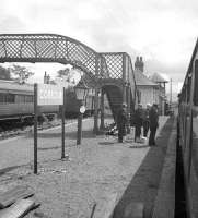 Platform scene at Corrour in the summer of 1966, when passengers still reached the platform by footbridge, now replaced by a barrow crossing.<br><br>[David Spaven //1966]
