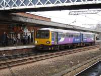Northern Rail 2-car Pacer 144007 runs into platform 2 at Wakefield Westgate, to form the 08.39 service to Leeds via Wakefield Kirkgate, Huddersfield, Halifax and Bradford. This 'roundabout' journey will take 1 hour 48 minutes, whereas the direct service to Leeds takes 20 minutes or less. <br><br>[David Pesterfield 22/02/2012]