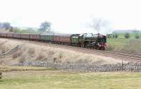 The <I>'Cumbrian Mountain Express'</I> on its return journey south via the Settle & Carlisle route on 25 February 2012. The train is passing through Smardale behind Britannia Pacific no 70013 <I>Oliver Cromwell</I>.<br><br>[Jim Peebles 25/02/2012]