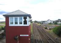 Looking south from the footbridge over the level crossing at Carnoustie in August 2006 towards the site of the original 1838 station, replaced in 1900 by the current structure, located on the north side of the crossing behind the camera.<br><br>[John Furnevel 12/08/2006]