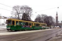 A Valmet Nr tram passes along Mannerheimintie at the Finlandia Hall in February 2012. This one has had an additional low-floor centre section inserted [see image 35154 for a non-modified version].<br><br>[Colin Miller 23/02/2012]