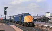 40074 arrives at Haymarket with a Waverley bound train in April 1981. Business as usual at Haymarket coal depot in the background.<br><br>[Peter Todd 21/04/1981]