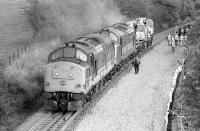 37685 + 37801 stand with a pair of cranes on the down line a little to the west of Aberdour on 19 October 1997. A new trackbed for the up line has recently been prepared. <br><br>[Bill Roberton 19/10/1997]