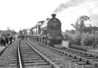 Ex-NBR no 256 <i>Glen Douglas</i> and J37 no 64624 stand at Roxburgh on 9 July 1961 having run round the RCTS (West Riding Branch) <I>'Borders Railtour'</I>. The train had just completed a visit to the Jedburgh branch [see image 22141] and would shortly be heading east on the next leg to Tweedmouth. From there the special would return to Leeds City via the ECML and the Leeds Northern route.<br><br>[K A Gray 09/07/1961]