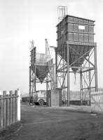 Entrance to the goods yard at West Kilbride in February 1963, complete with cement silos. <br><br>[R Sillitto/A Renfrew Collection (Courtesy Bruce McCartney) 25/02/1963]